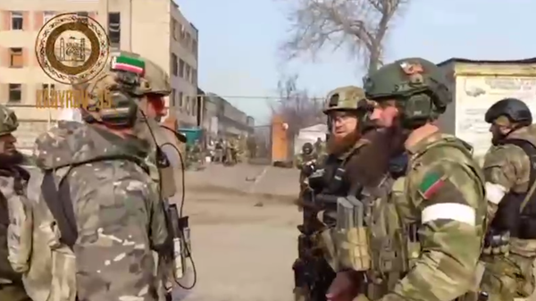 A screenshot of a video posted by the head of Chechnya, Ramzan Kadyrov, depicting troops encircling the Azovstal plant in Mariupol. - Sputnik International