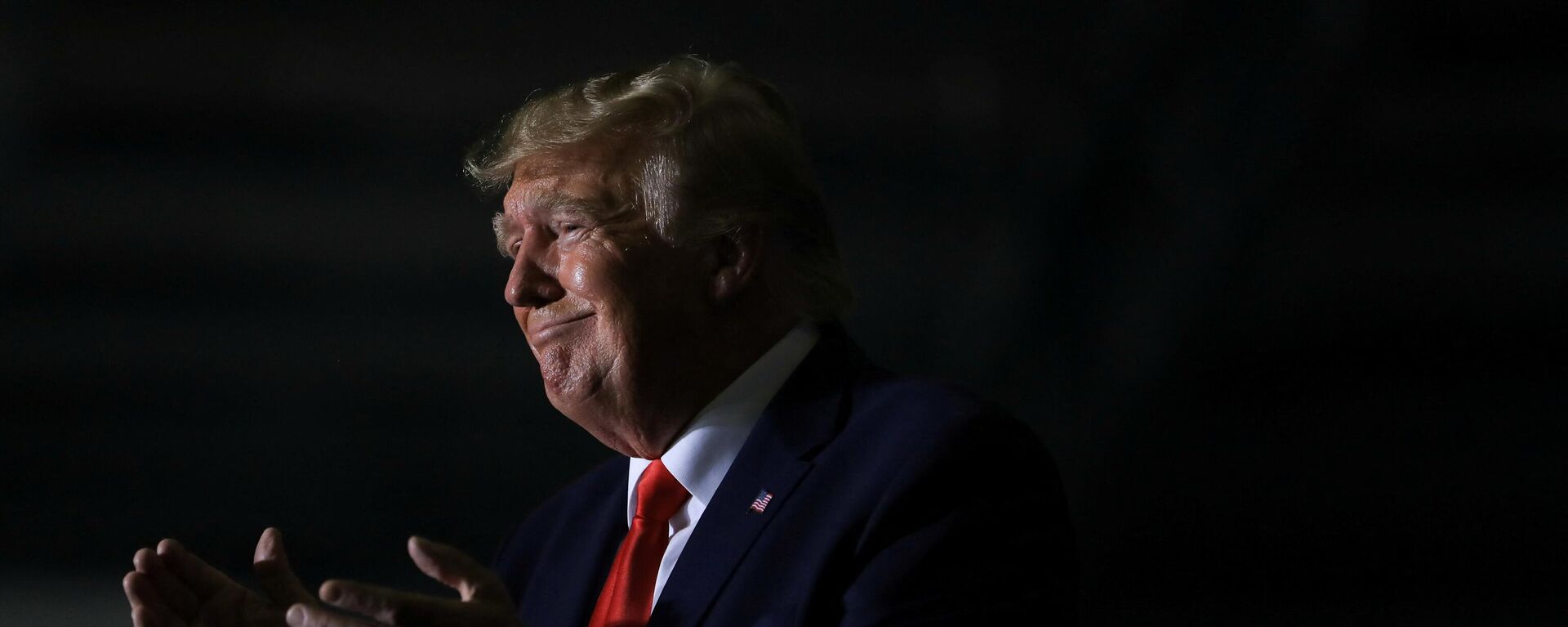 Former U.S. President Donald Trump claps as Michigan Secretary of State candidate Kristina Karamo speaks during a rally in Washington Township, Michigan, U.S. April 2, 2022. - Sputnik International, 1920, 10.04.2022