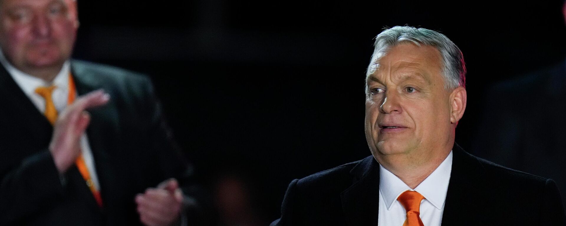 Hungary's Prime Minister Viktor Orban acknowledges cheering supporters during an election night rally in Budapest, Hungary, Sunday, April 3, 2022. - Sputnik International, 1920, 18.06.2023