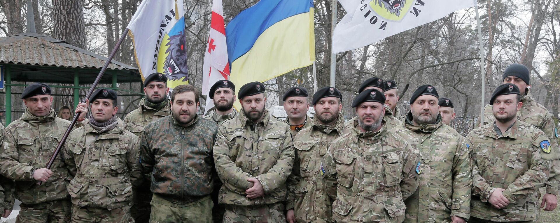 Officers of the Georgian National Legion volunteer battalion pose for a photo prior to their departure to the area of the war conflict in Ukraine's east, in Kiev, Ukraine, Tuesday, March 15, 2016. The Georgian National Legion consists mostly of Georgians, but there are also the US, French and Belgian citizens. (AP Photo/Efrem Lukatsky) - Sputnik International, 1920, 06.04.2022