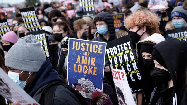 Students participate in a state-wide walkout demanding justice for Amir Locke a Black man who was shot and killed by Minneapolis police, in St. Paul, Minnesota, U.S., February 8, 2022. - Sputnik International