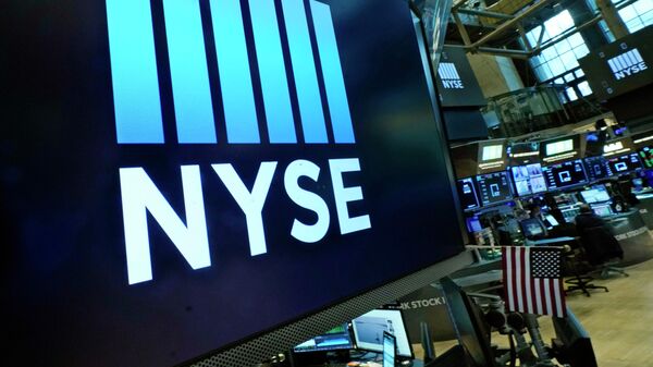  Logos the New York Stock Exchange adorn trading posts, on the floor, Wednesday, March 16, 2022. - Sputnik International