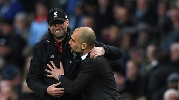 Liverpool's German manager Jurgen Klopp (L) greets Manchester City's Spanish manager Pep Guardiola after the English Premier League football match between Manchester City and Liverpool at the Etihad Stadium in Manchester, north west England, on March 19, 2017. - Sputnik International