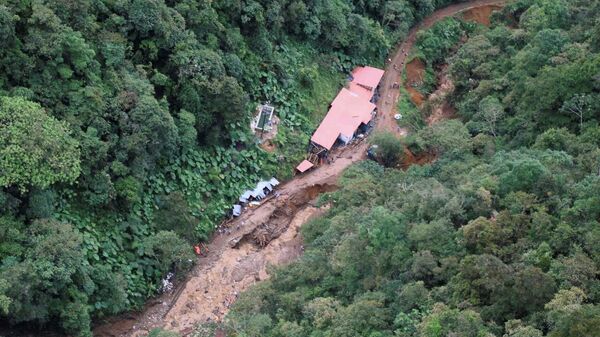 An aerial view taken from an overflight by Antioquia Governor Anibal Gaviria of the area affected by a flash flood that flooded a gold mine and left at least 10 dead, in Abriaqui, Colombia April 7, 2022. - Sputnik International