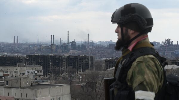 A serviceman of Russian special police rapid response detachment Akhmat is seen in Mariupol, Donetsk People's Republic. - Sputnik International