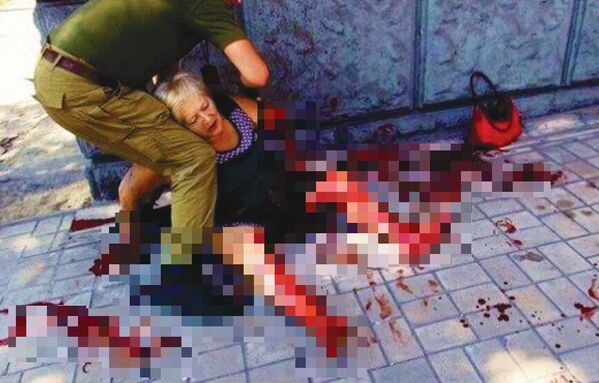 14 August 2014, near the intersection of Artema Street and the RKKA 25th Anniversary Street, Donetsk. An elderly woman was killed by UAF shelling. - Sputnik International