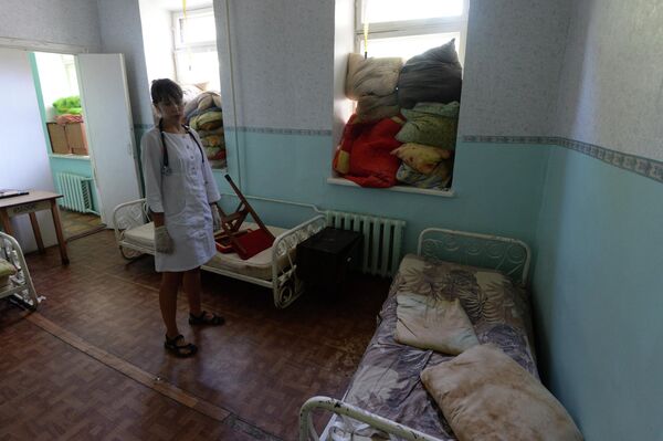 Donbass’s civilian hospitals have been the targets of armed attacks and shelling since the early days of the conflict.Above: Ward of the city hospital in Gorlovka, Donetsk People’s Republic (DRP). The windows are covered by pillows, the city is being shelled by the Ukrainian army. - Sputnik International
