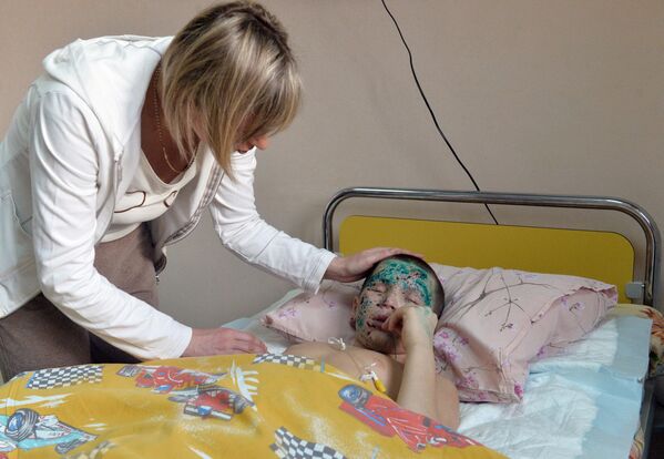 Nine-year-old Vanya Voronov was seriously injured when a shell exploded in Shakhtyorsk, Donetsk region. The boy lost his eyesight, both legs, and an arm. He was transported to Moscow for treatment in 2015. Vanya&#x27;s younger brother Timofey was killed. - Sputnik International