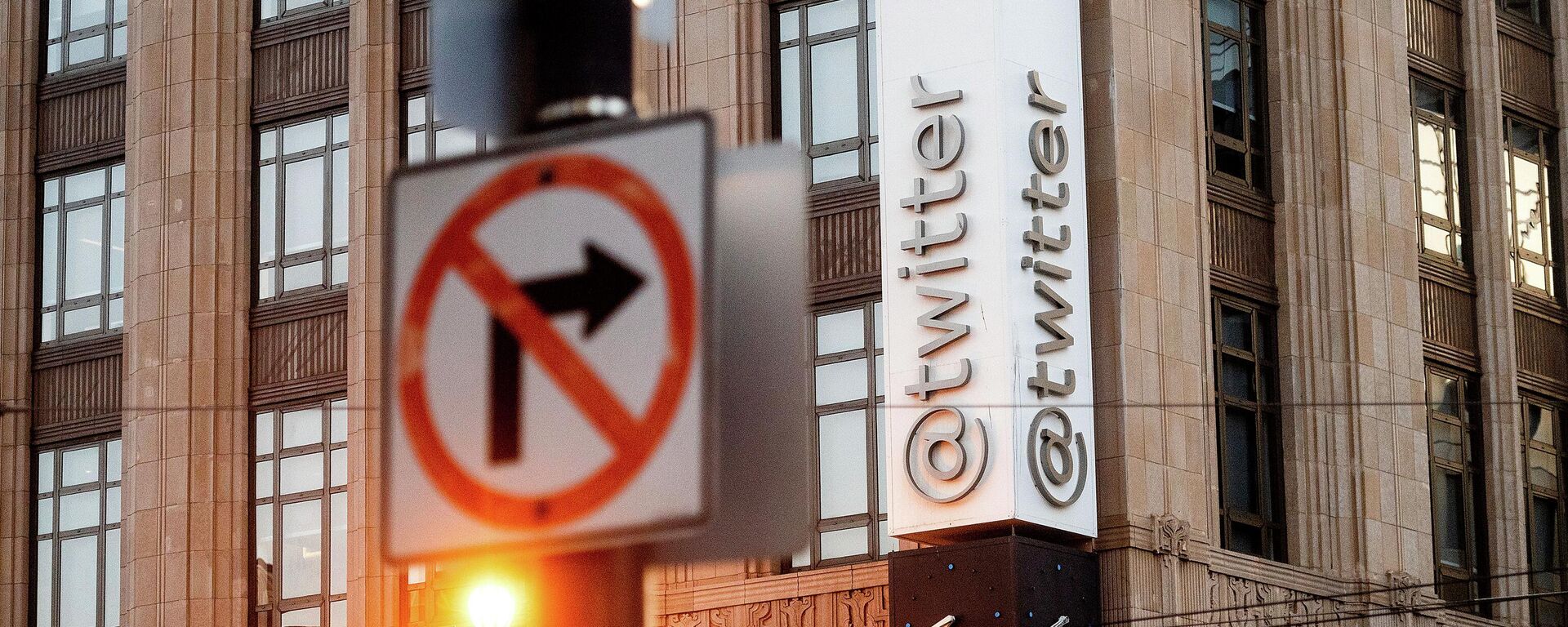 In this Jan. 11, 2021, file photo, a sign hangs at Twitter headquarters in San Francisco. Republican state lawmakers are pushing for social media giants to face costly lawsuits for policing content on their websites, taking aim at a federal law that prevents internet companies, like Twitter, from being sued for removing posts. - Sputnik International, 1920, 07.05.2022