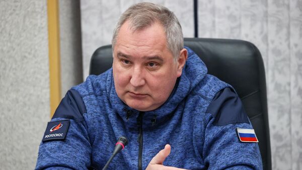 Director General of the Roscosmos state corporation Dmitry Rogozin at a meeting of the State Commission before the launch of the Soyuz MS-21 spacecraft at the Baikonur Cosmodrome. - Sputnik International