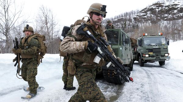 U.S. Marines participate in a military exercise called Cold Response 2022, gathering around 30,000 troops from NATO member countries plus Finland and Sweden, amid Russia's invasion of Ukraine, near Bjerkvik in the Arctic Circle, Norway, March 24, 2022 - Sputnik International