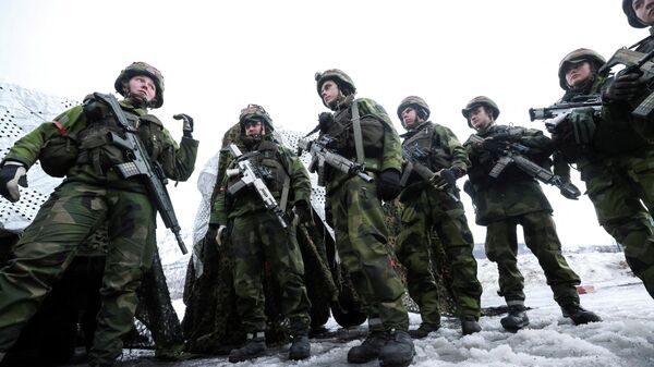 Swedish soldiers take part in a military exercise called Cold Response 2022, gathering around 30,000 troops from NATO member countries plus Finland and Sweden, amid Russia's invasion of Ukraine, in Evenes, Norway, March 22, 2022.  - Sputnik International