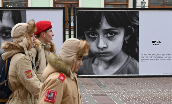Liza, 6 years old. &quot;All through the conflict, the girl has been living in one of the most shelled areas of Donetsk. The fighting started when Liza was a little girl. All her conscious life she has been living in the context of hostilities&quot;. - Sputnik International