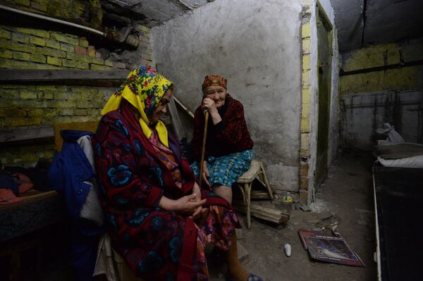 In April 2014, Acting Ukrainian President Alexander Turchinov announced the launch of an &quot;Anti-Terrorist Operation&quot; in Donbass. In reality, this operation turned out to be a war against its own people - with air raids on cities and full-fledged fighting with the use of heavy military equipment.Photo: Shakhtyorsk residents in the basement of a residential building during artillery shelling of the city by the Ukrainian military, 2014. - Sputnik International