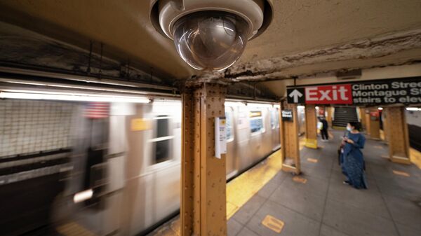 A video surveillance camera is installed on the ceiling above a subway platform in the Court Street station in the Brooklyn borough of New York - Sputnik International