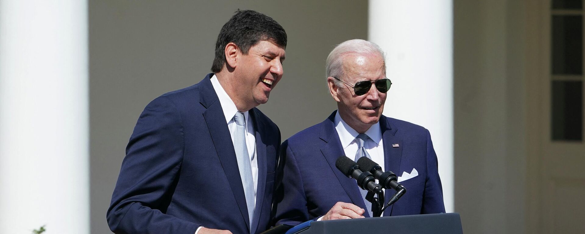 US President Joe Biden (R) stands next to Steve Dettelbach, nominee for director of the Bureau of Alcohol, Tobacco, Firearms, and Explosives, after he spoke on measures to combat gun crime from the Rose Garden of the White House in Washington, DC, on April 11, 2022 - Sputnik International, 1920, 12.04.2022