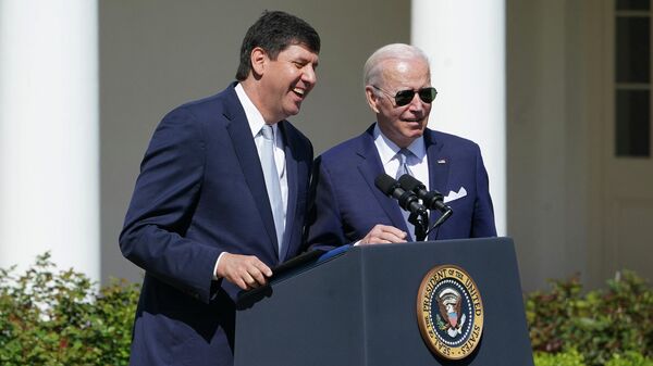 US President Joe Biden (R) stands next to Steve Dettelbach, nominee for director of the Bureau of Alcohol, Tobacco, Firearms, and Explosives, after he spoke on measures to combat gun crime from the Rose Garden of the White House in Washington, DC, on April 11, 2022 - Sputnik International