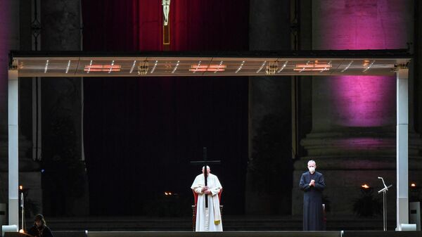 Pope Francis (C) leads the celebration of the Way of the Cross (Via Crucis) as part of Good Friday on April 2, 2021 at St. Peter's square in the Vatican - Sputnik International