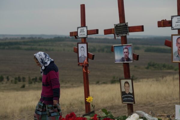 A woman walks past the graves of militia fighters who died in battles with the Ukrainian Army near the Saur-Mogila height. In 2014, the area saw heavy battles, just as it had during the Great Patriotic War. It’s difficult to count how many young men have been killed in the eight-year-long war in Donbass. According to the United Nations, over 13,000 people have died in the conflict, among them husbands, brothers, fathers, and sons who lost their lives defending independence and the right to live on their land, the rights of their families to learn and speak Russian, the right not to support the radical nationalist course of contemporary Ukraine. - Sputnik International