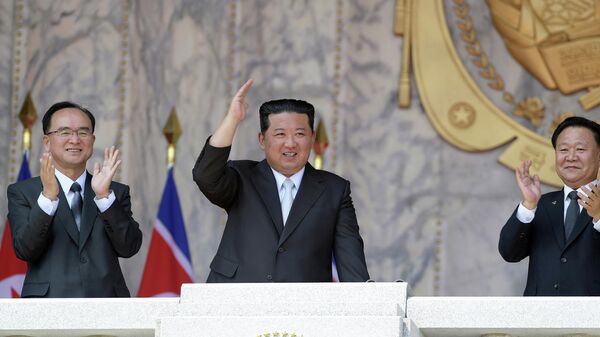 This picture taken on April 15, 2021 and released from North Korea's official Korean Central News Agency (KCNA) on April 16 shows North Korean leader Kim Jong Un (C) giving a speech at Kim Il Sung Square to mark the Day of the Sun, the 110th birth anniversary of late North Korean leader Kim Il Sung, in Pyongyang. - Sputnik International