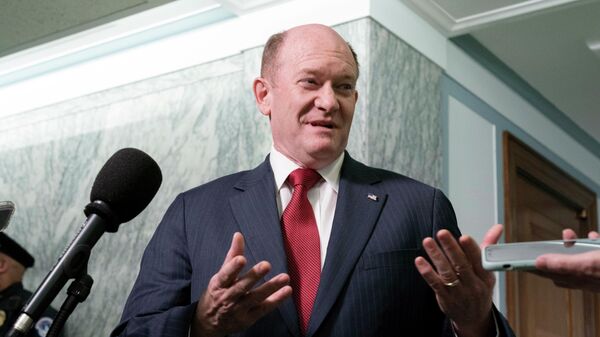 Sen. Chris Coons, D-Del., speaks to reporters after a break during the nomination hearing of Supreme Court nominee Ketanji Brown Jackson, during the third day of her confirmation hearing before the Senate Judiciary Committee, on Capitol Hill, Wednesday, March 23, 2022, in Washington. - Sputnik International