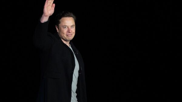 In this file photo taken on February 10, 2022 Elon Musk gestures as he speaks during a press conference at SpaceX's Starbase facility near Boca Chica Village in South Texas - Sputnik International