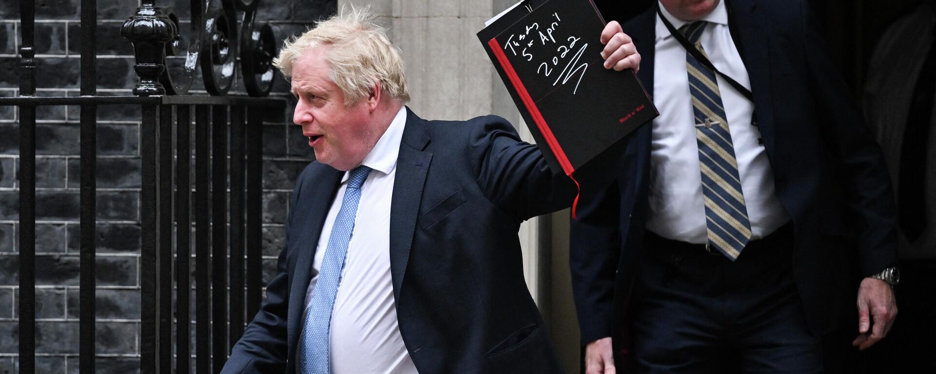 Britain's Prime Minister Boris Johnson leaves the 10 Downing Street, in London, on April 19, 2022, to give a statement at the House of Commons. - Sputnik International, 1920, 19.04.2022