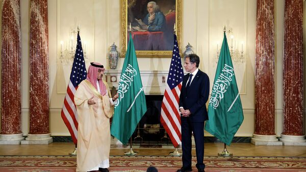 Secretary of State Antony Blinken and Saudi Foreign Minister Prince Faisal Bin Farhan Al Saud speak to reporters at the State Department in Washington, Thursday, Oct. 14, 2021. - Sputnik International