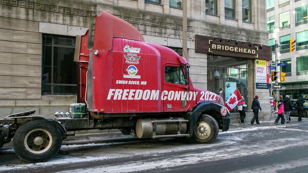 The words Freedom Convoy 2022 are visible on a truck that is part of a demonstration against COVID-19 restrictions in Ottawa, Ontario, Canada, on Sunday, Feb. 13, 2022. - Sputnik International