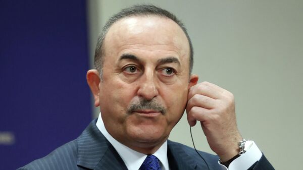 Turkish Foreign Minister Mevlut Cavusoglu gives a press conference after his meeting with his Hungarian counterpart in Ankara, on April 19, 2022. - Sputnik International