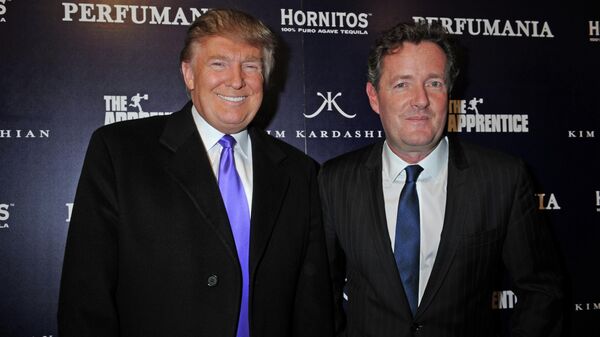 Donald Trump, left, and Piers Morgan arrive for the Perfumania party celebrating the appearance of Kim Kardashian on the reality show The Apprentice, Wednesday, Nov. 10, 2010, in New York. - Sputnik International