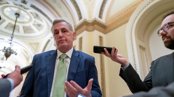 House Minority Leader Kevin McCarthy, R-Calif., talks to reporters as the House voted to hold former President Donald Trump advisers Peter Navarro and Dan Scavino in contempt of Congress over their monthslong refusal to comply with subpoenas from the committee investigating the Jan. 6 attack, at the Capitol in Washington, Wednesday, April 6, 2022. - Sputnik International