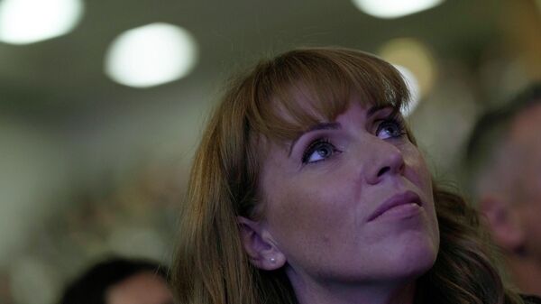 Labour deputy leader Angela Rayner watches as the leader of the British Labour Party Keir Starmer makes his keynote speech at the annual party conference in Brighton, England, Wednesday, Sept. 29, 2021.  - Sputnik International