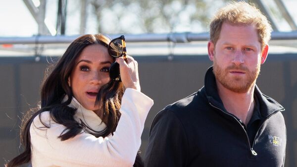 Prince Harry and Meghan Markle, Duke and Duchess of Sussex visit the track and field event at the Invictus Games in The Hague, Netherlands, Sunday, April 17, 2022. The week-long games for active servicemen and veterans who are ill, injured or wounded opened Saturday in this Dutch city that calls itself the global center of peace and justice. - Sputnik International