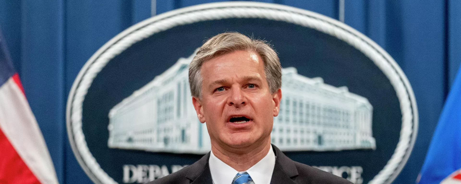 FBI Director Christopher Wray speaks at a news conference at the Justice Department in Washington, on Nov. 8, 2021. Wray says the threat to the West from the Chinese government is more brazen and damaging than ever before. In a speech on Jan. 31, 2022, at the Reagan Presidential Library in California, Wray accused Beijing of stealing American ideas and innovation and launching massive hacking operations.  - Sputnik International, 1920, 31.10.2023