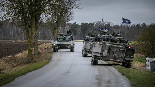 Gotland's Regiment patrols in tanks on the roads in nothern Gotland on January 16, 2022. - Sweden deployed armoured combat vehicles and armed soldiers to patrol streets on the island of Gotland in response to increased Russian activity in the region. (Photo by Karl MELANDER / various sources / AFP) /  - Sputnik International