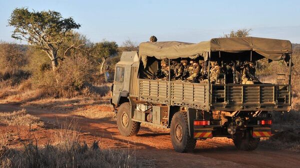 Soldiers 1st Battalion The Princess of Wales's Royal Regiment are transported on a Troop Carrying Vehicle (TCV) during Exercise Askari Thunder - Sputnik International