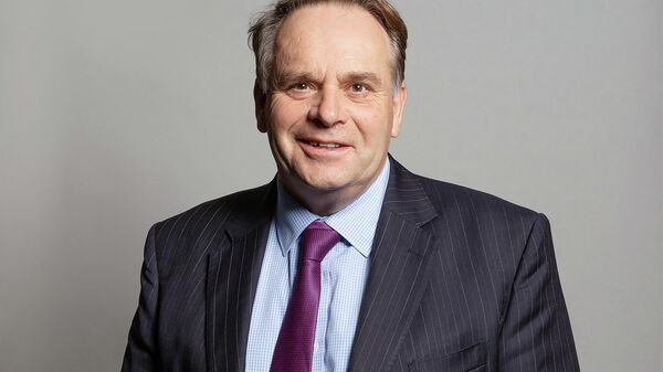 An undated handout photograph released by the UK Parliament shows Conservative MP for Tiverton and Honiton, Neil Parish, posing for an official portrait photograph at the Houses of Parliament in London - Sputnik International