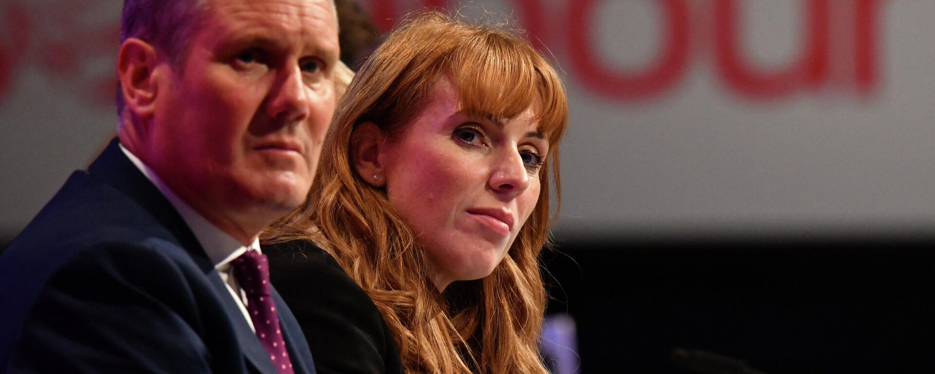 Britain's main opposition Labour Party leader Keir Starmer (L) and Britain's main opposition Labour Party deputy leader Angela Rayner sit in the conference hall for the the debate on the leadership election rules changes, on the second day of the annual Labour Party conference at The Brighton Centre in Brighton on the south coast of England, on September 26, 2021 - Sputnik International, 1920, 09.05.2022
