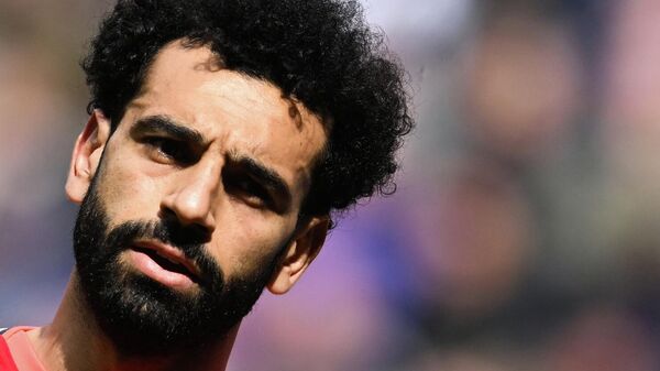 Liverpool's Egyptian midfielder Mohamed Salah reacts during the English Premier League football match between Newcastle United and Liverpool at St James' Park in Newcastle-upon-Tyne, north east England on April 30, 2022.  - Sputnik International