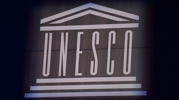This photograph shows the logo of UNESCO during the 75th anniversary celebrations of The United Nations Educational, Scientific and Cultural Organization (UNESCO) at UNESCO headquarters in Paris on November 12, 2021. - Sputnik International