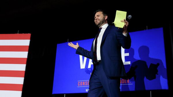 Republican Senate candidate JD Vance takes the stage as he prepares to speak during an election night watch party, Tuesday, May 3, 2022, in Cincinnati.  - Sputnik International