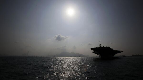 The aircraft carrier USS George Washington anchors in the Hong Kong water Thursday, Oct. 29, 2009 - Sputnik International
