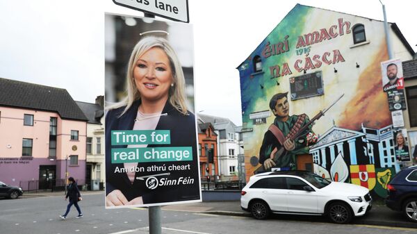 A Sinn Fein election poster hangs from a lamp post in West Belfast, Northern Ireland, Tuesday, May 3, 2022 - Sputnik International