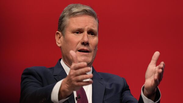 Leader of the British Labour Party Keir Starmer gestures as he makes his keynote speech at the annual party conference in Brighton, England, Sept. 29, 2021 - Sputnik International