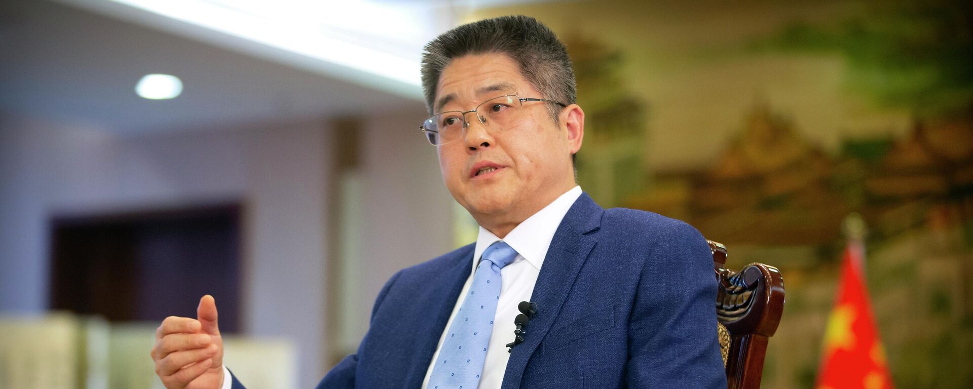 Chinese Vice Minister of Foreign Affairs Le Yucheng speaks during an interview with the Associated Press at the Ministry of Foreign Affairs in Beijing, Friday, April 16, 2021. - Sputnik International, 1920, 06.05.2022