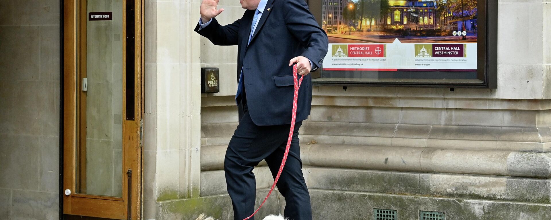 Britain's Prime Minister Boris Johnson arrives with his dog Dilyn at the Methodist Hall in central London to cast his vote in local elections on May 5, 2022 - Sputnik International, 1920, 07.05.2022