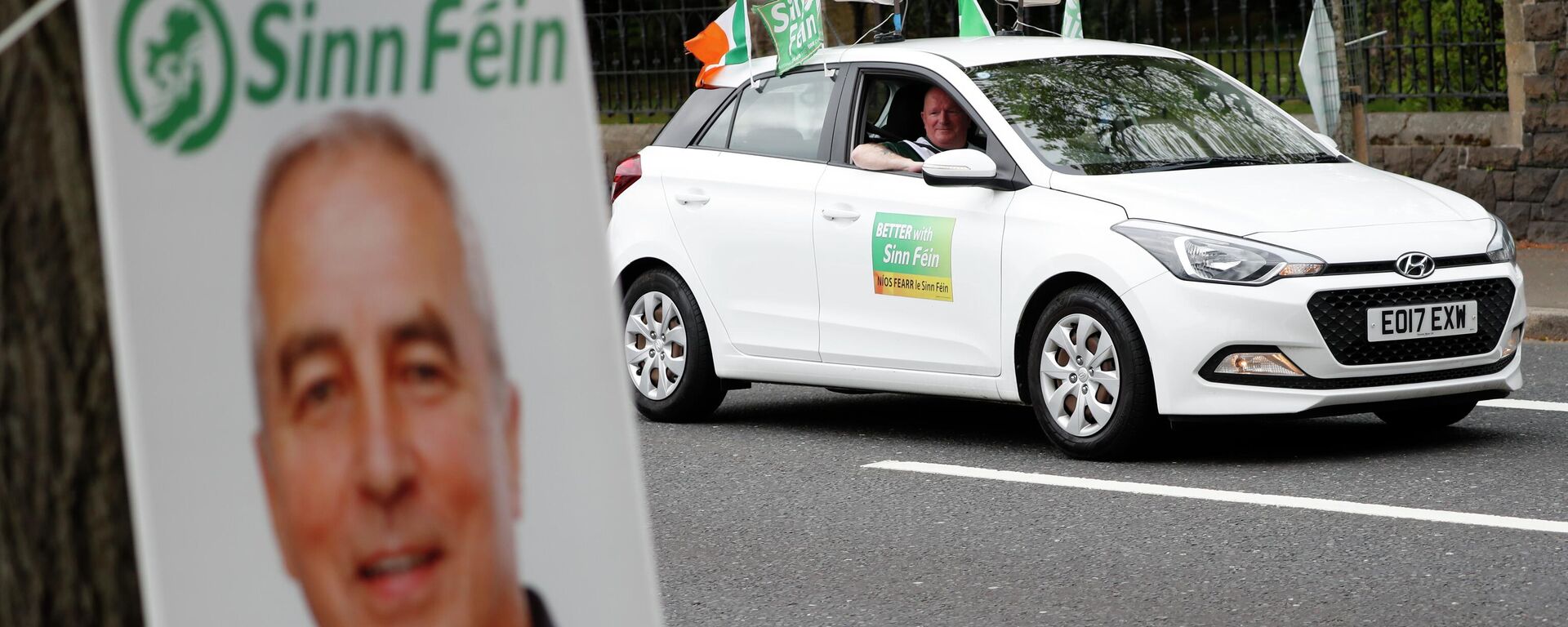 A Sinn Fein canvassing car plays music on the Falls road in West Belfast, Northern Ireland, Thursday May 5, 2022 - Sputnik International, 1920, 08.05.2022