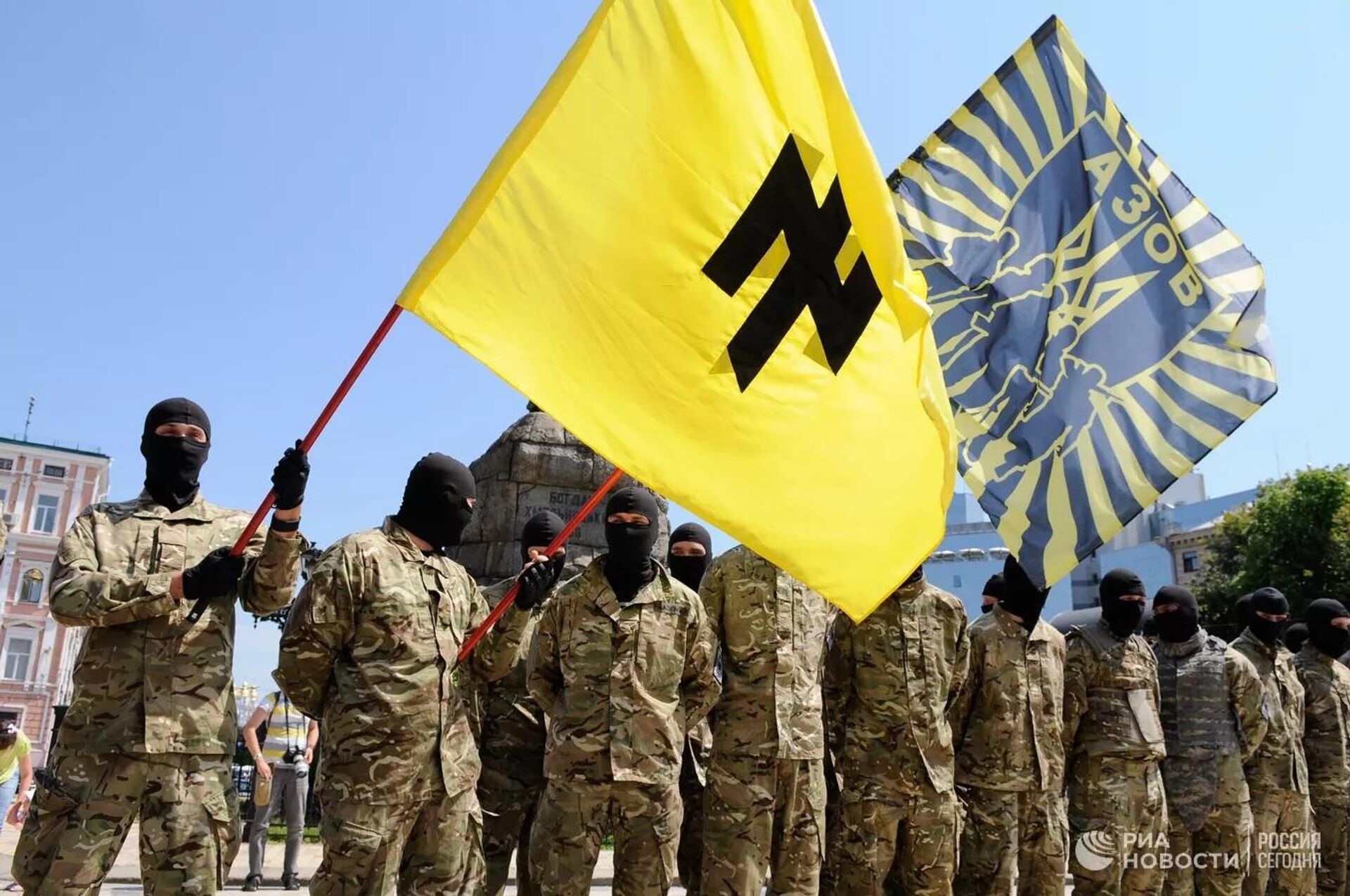 Fighters of the neo-Nazi Azov Battalion take the oath of allegiance to Ukraine in Sophia Square in Kiev before being sent to Donbass. Members of the Nazi battalion have committed hundreds of war crimes against the population of Donbass over eight years. The Azov flag has an inverted image of the runic symbol “Wolfsangel”, which was used by the Nazis. - Sputnik International, 1920, 25.07.2022