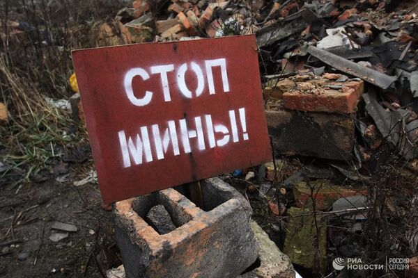 Eight years of conflict have left a mark: it will take decades to demine the territory of the republics. Photo: A warning sign at a position near the line of contact with Ukrainian forces near Spartak village in the Donetsk region.
 - Sputnik International